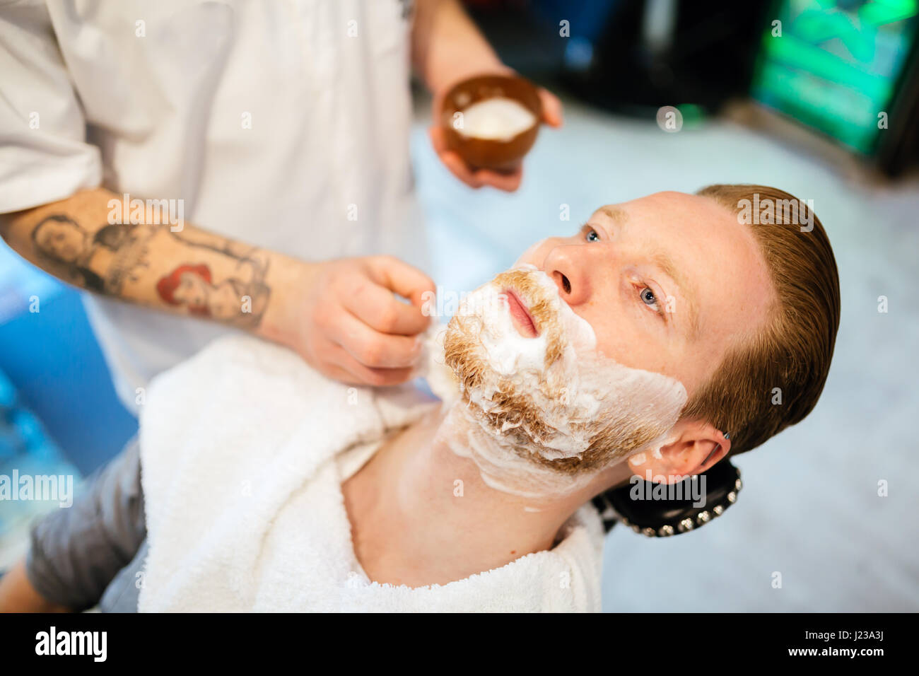 Hair beard and mustache treatment in barber shop Stock Photo Alamy