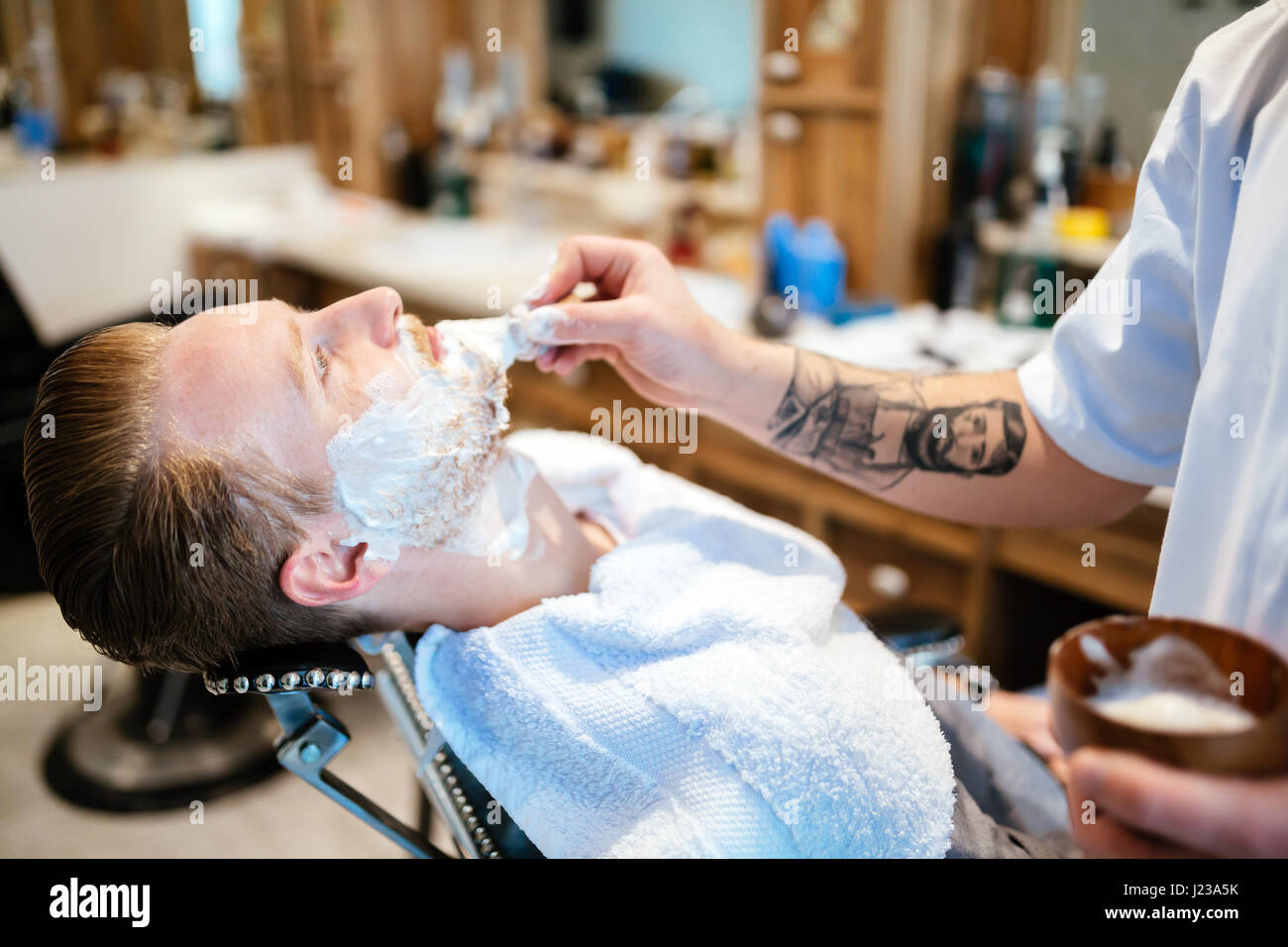 Hair beard and mustache treatment in barber shop Stock Photo Alamy