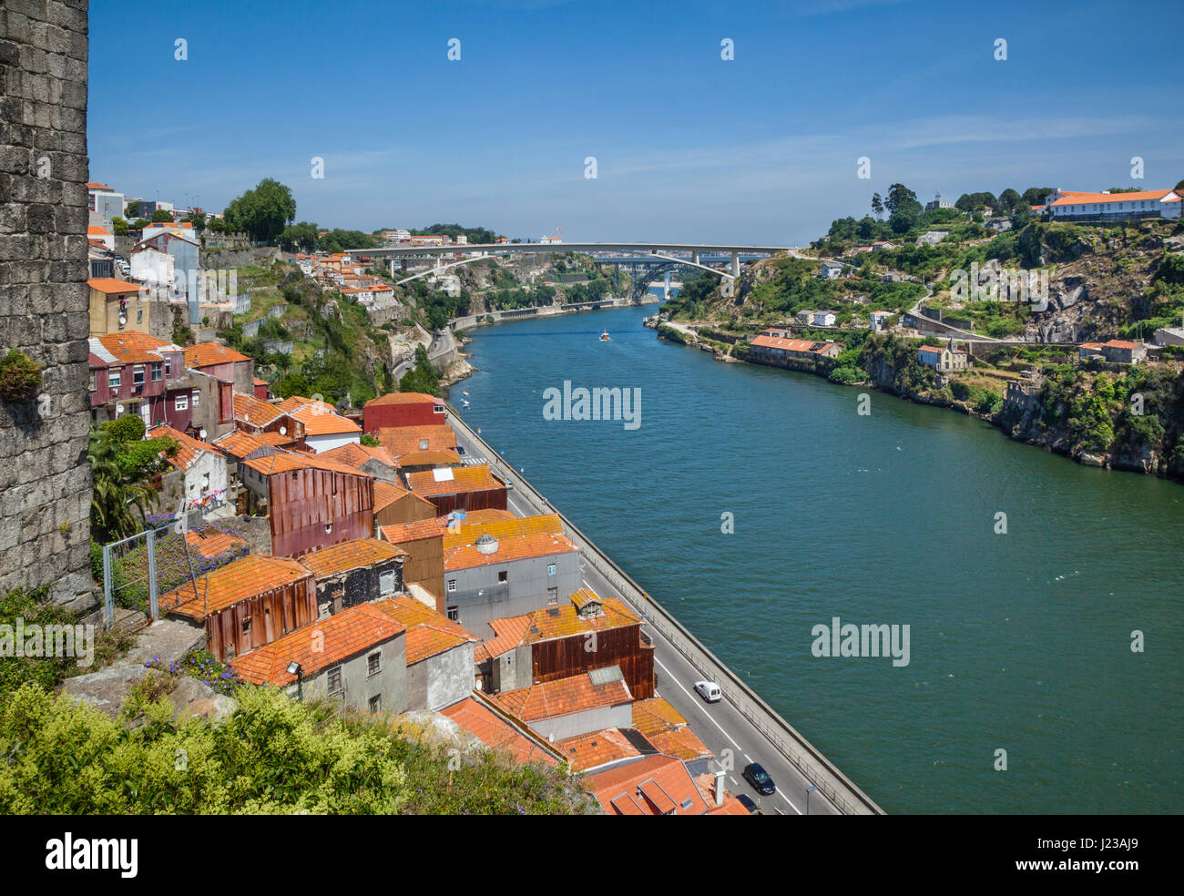 Portugal, Region Norte, Porto, view of the Douro River from Murallas fernadinas (Ferdinant Walls) with Puente do Infante and Puente Maria Pia in the b Stock Photo