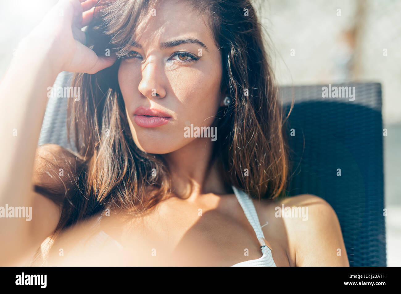 Beautiful woman sunbathing, fashion look Stock Photo Alamy