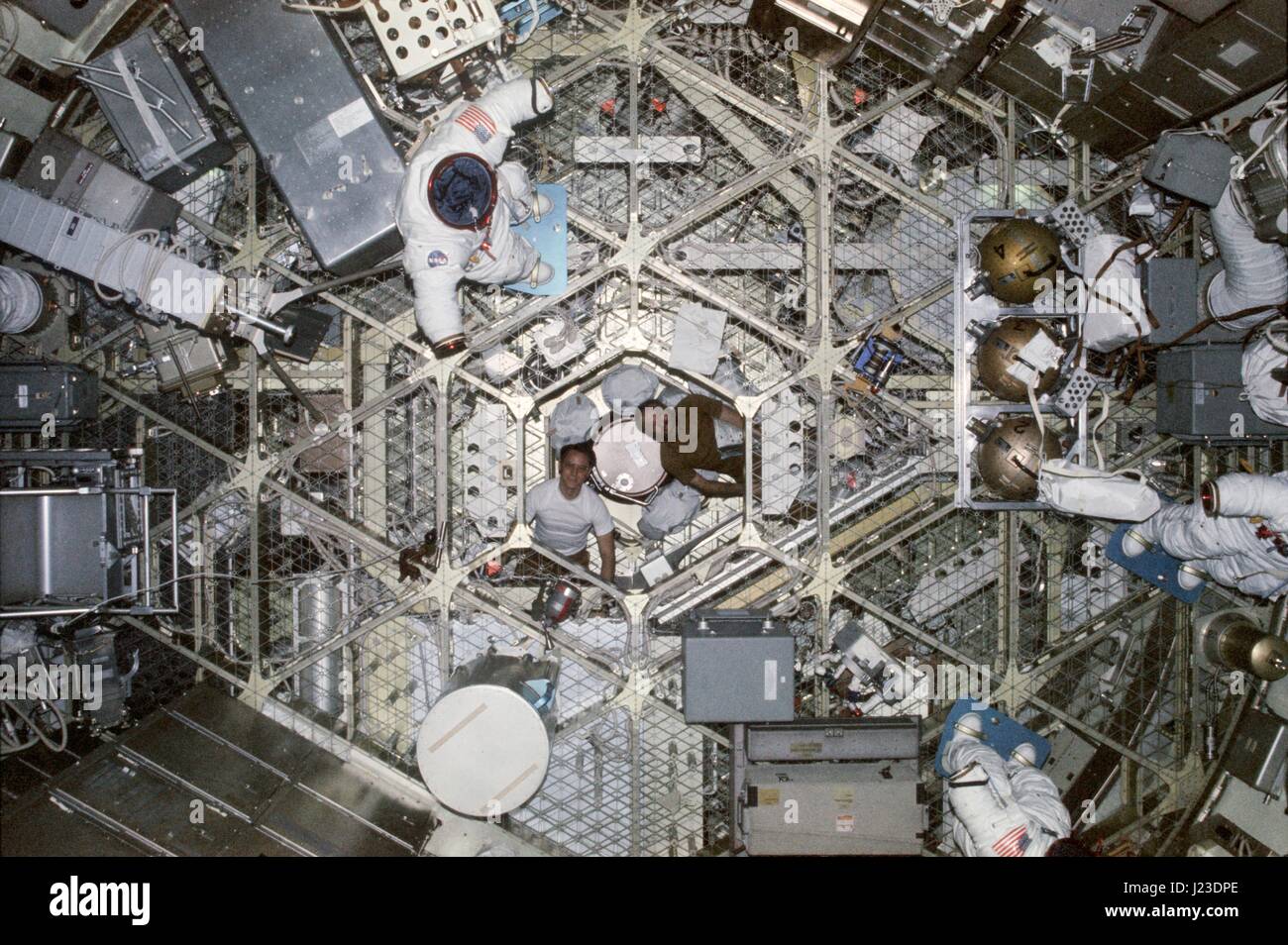 NASA astronauts Ed Gibson (left) and Jerry Carr look down from the passageway of the Skylab 4 space station command module Orbital Workshop February 1, 1974 while in Earth orbit.    (photo by NASA via Planetpix) Stock Photo