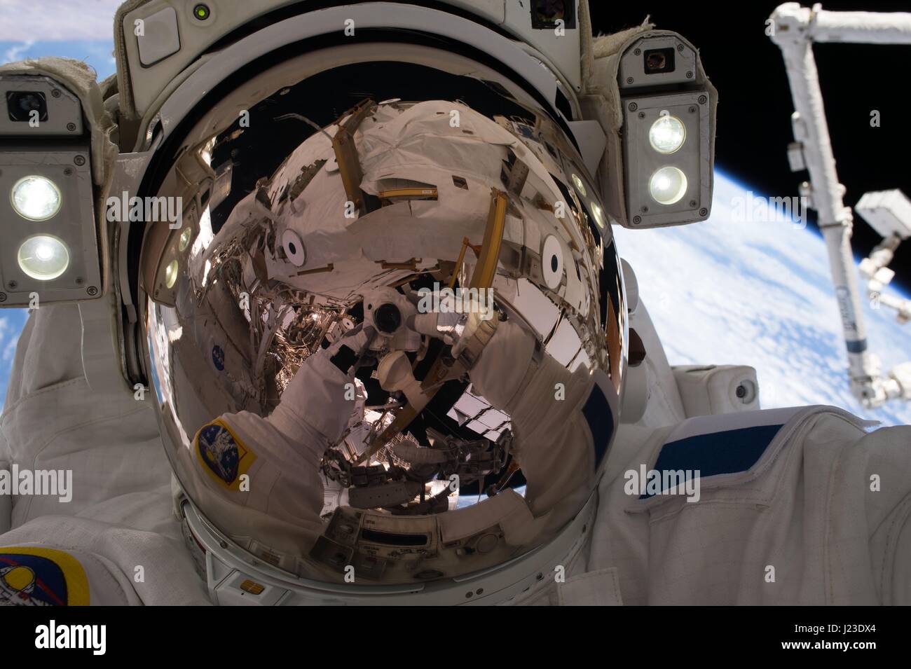 NASA Expedition 50 prime crew member French astronaut Thomas Pesquet of the European Space Agency works on the International Space Station during a spacewalk January 13, 2017 in Earth orbit.    (photo by NASA via Planetpix) Stock Photo