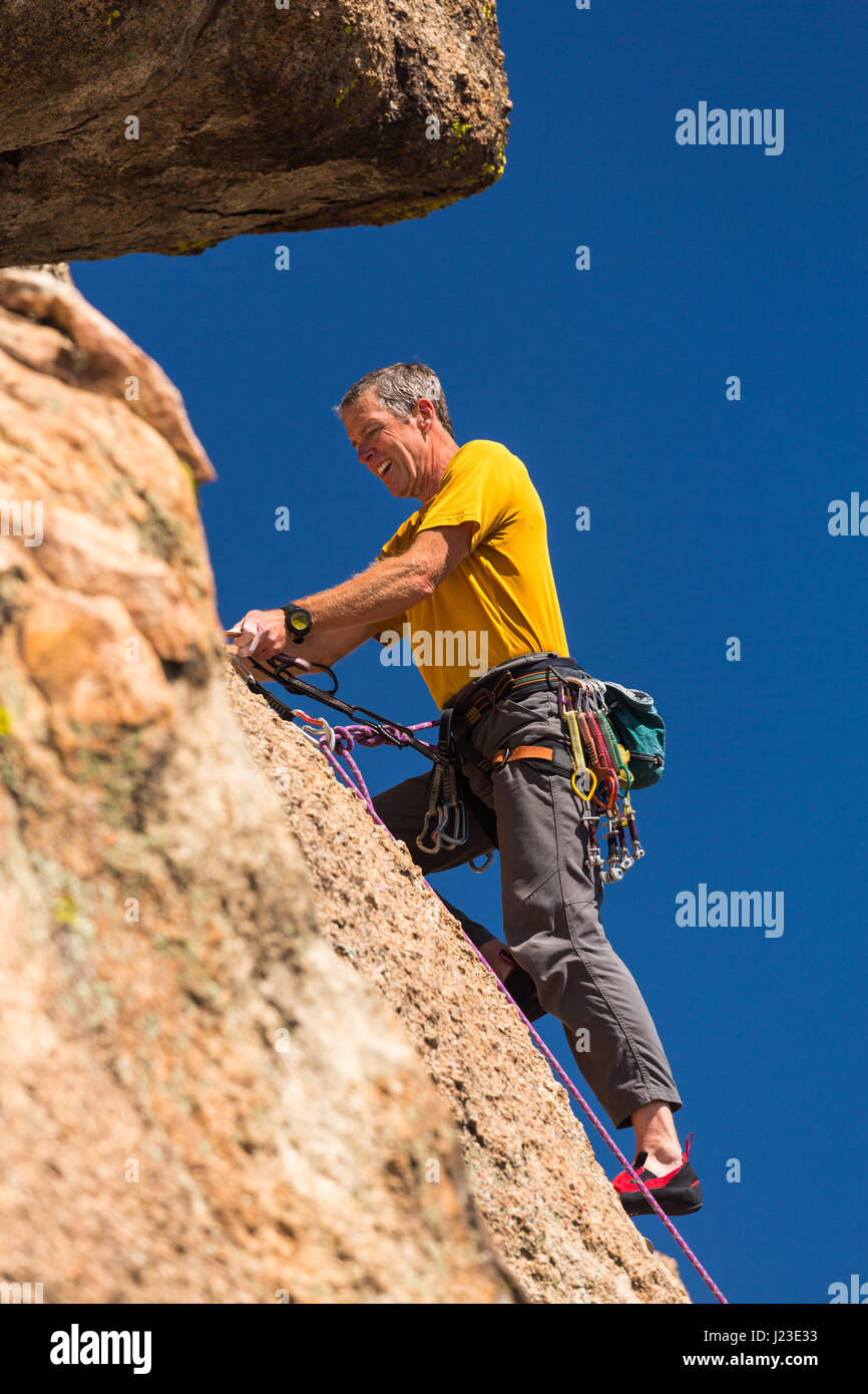 Rock climber - senior male rock climbing, Colorado, USA Stock Photo