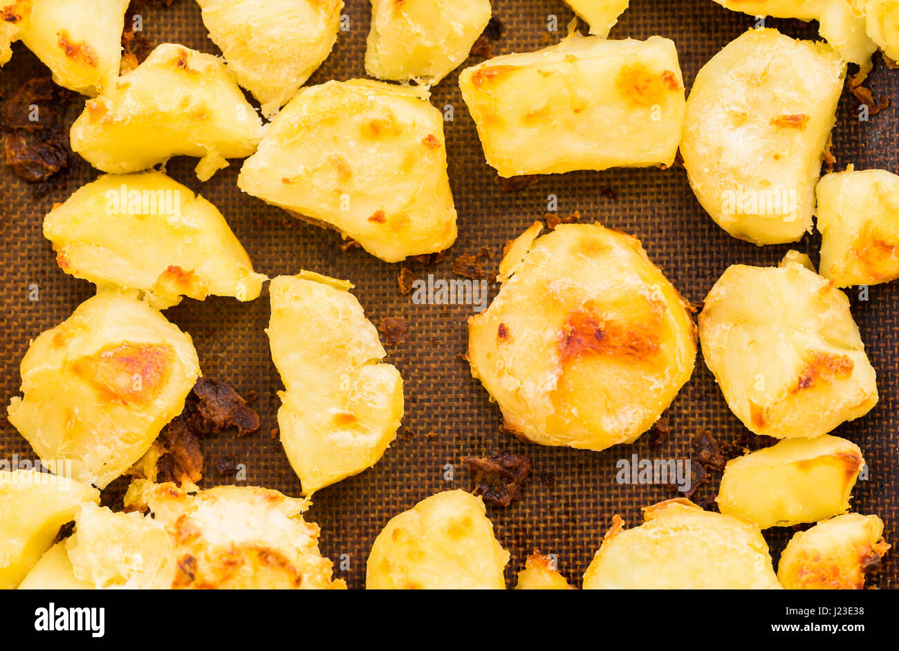 Roast potatoes from above close up Stock Photo