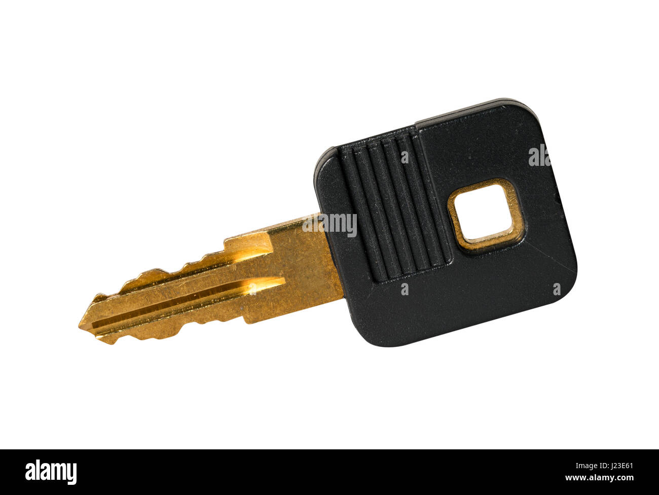 Brass key with black plastic handle Stock Photo