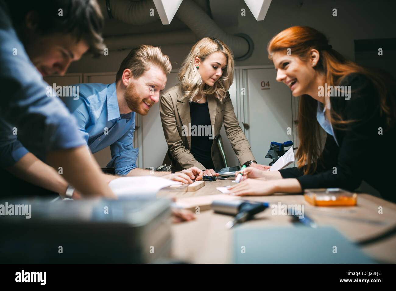 Group of designer working on project in workshop Stock Photo
