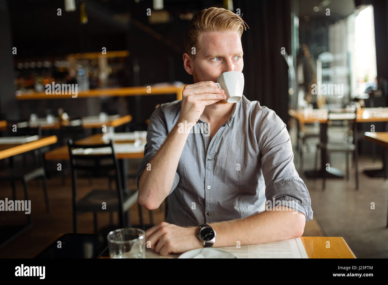 Businessman enjoying coffee during break Stock Photo