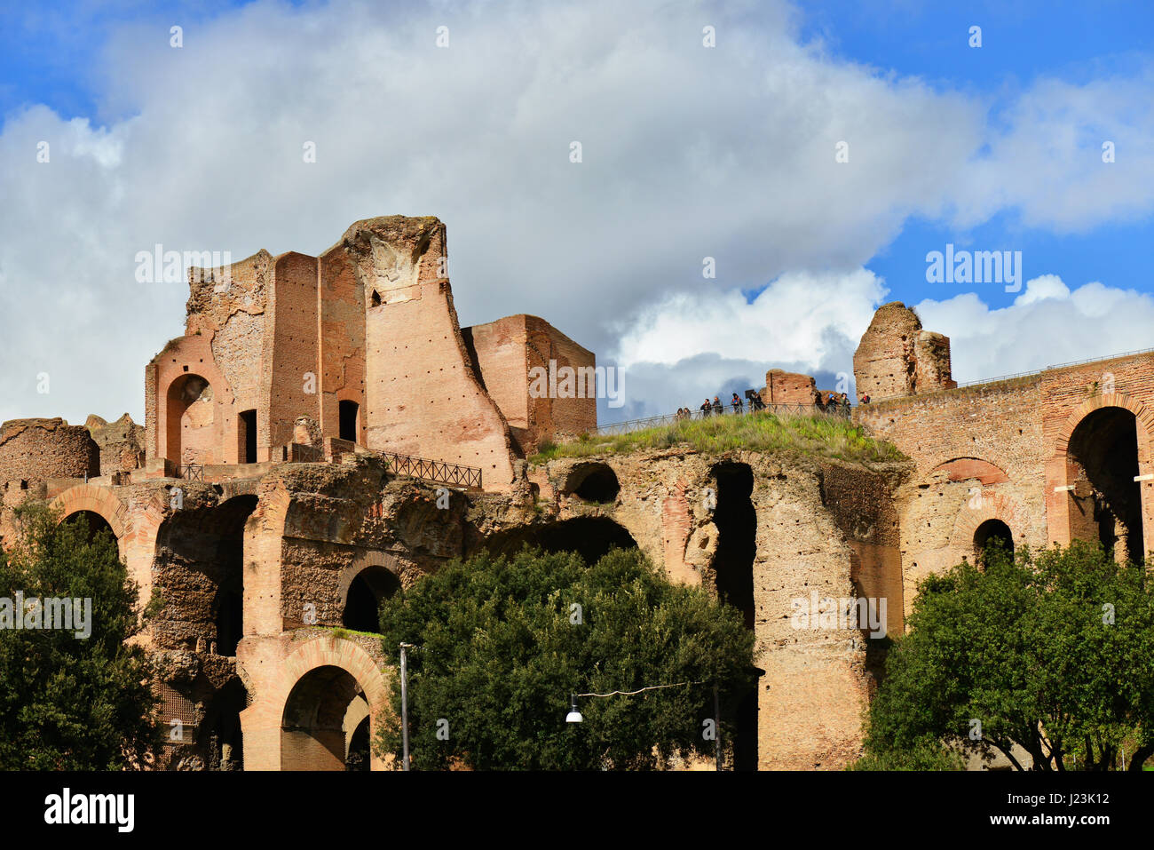 Tourists visit Palatine Hill Imperial Palace ruins in Rome Stock Photo