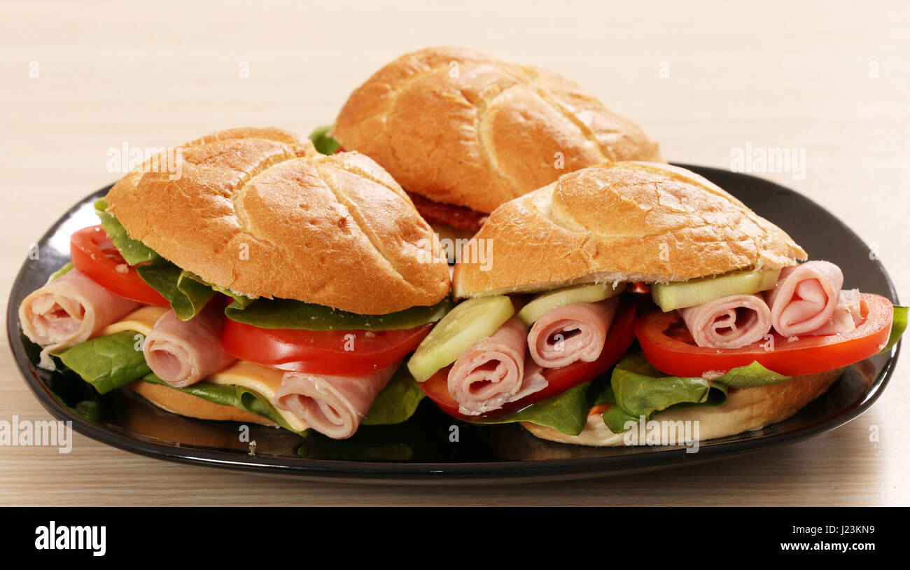 sandwich with salami cheese and salad Stock Photo