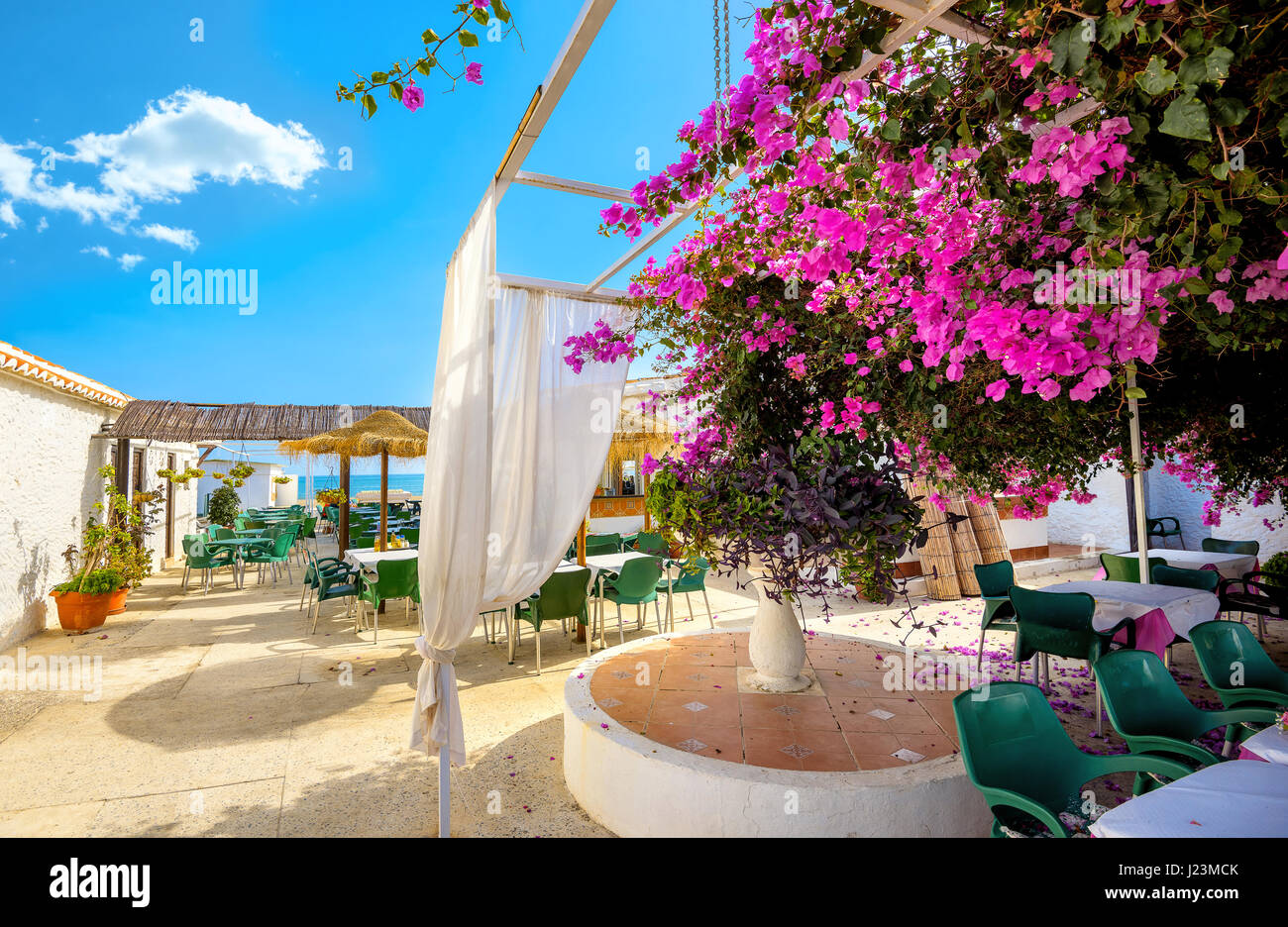 Courtyard of coastal cafe in Torremolinos. Malaga province, Costa del Sol. Andalusia, Spain Stock Photo
