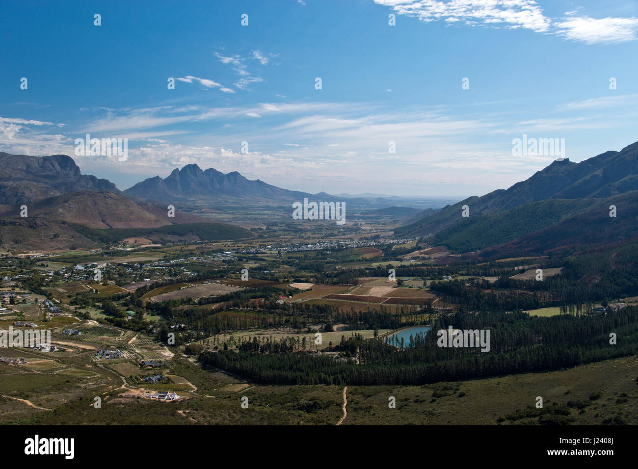 View of Franschhoek (Afrikaans for 'French Corner'), a valley wine town in the Western Cape Province and one of the oldest towns of South Africa. Stock Photo