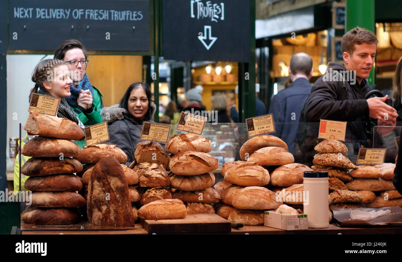 Customers queue to buy bread in Borough Market, south London, Britain March 22, 2017. © John Voos Stock Photo