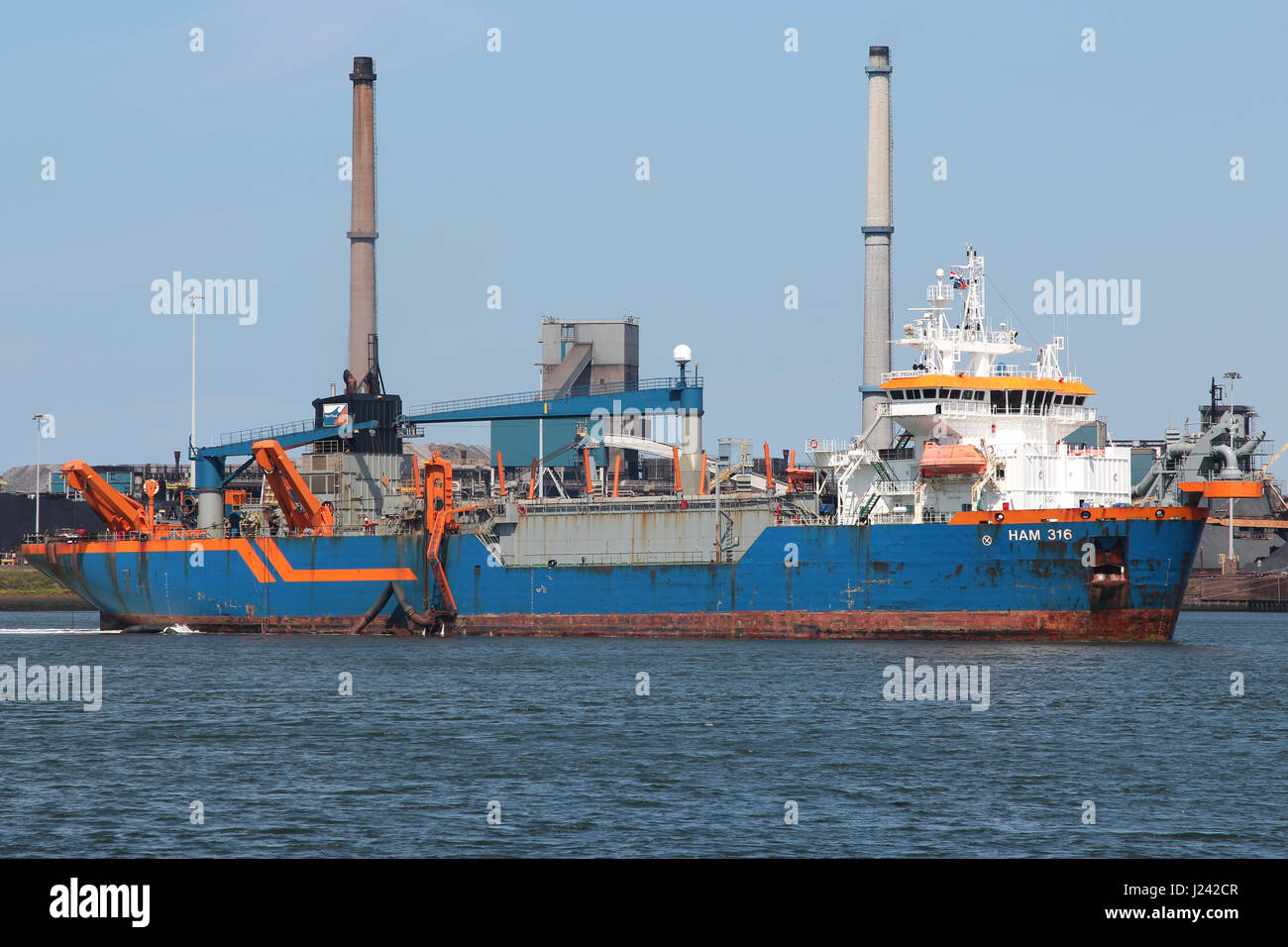 trailing suction hopper dredger HAM 316 operated by Van Oord, a Dutch contracting company with one of the world's largest dredging fleets. Stock Photo