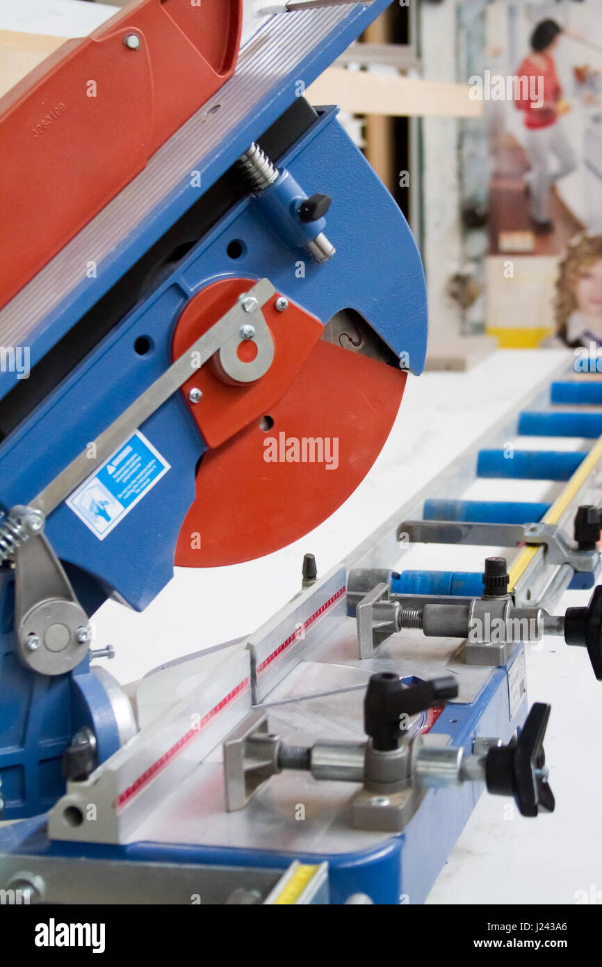 Men at work sawing wood. Circular saw. A machine which saws wood
