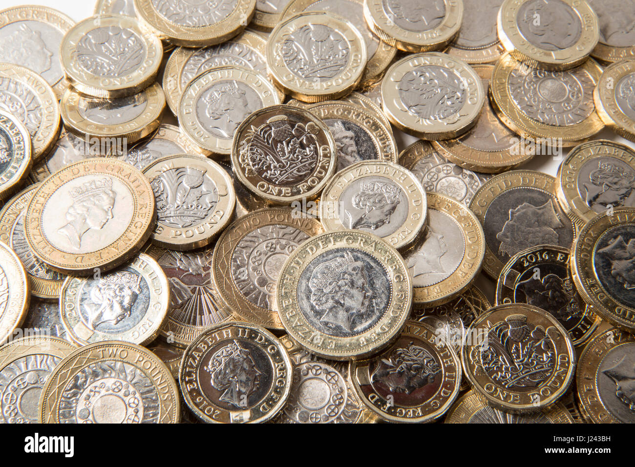 Random layout of New British £1 & £2 coins Stock Photo