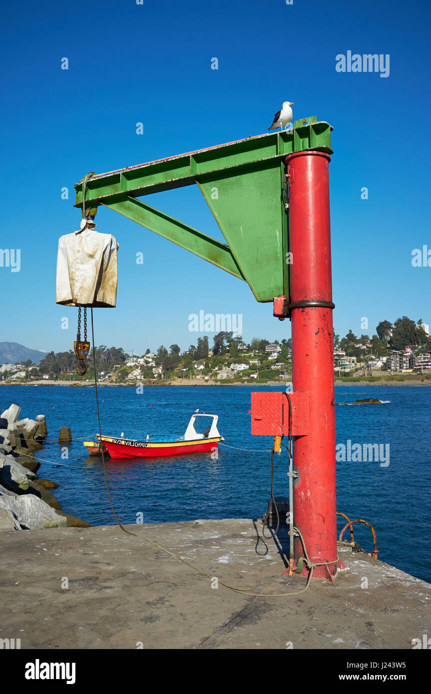 Hoist for lifting fishing boats out of the water on a jetty at Concon