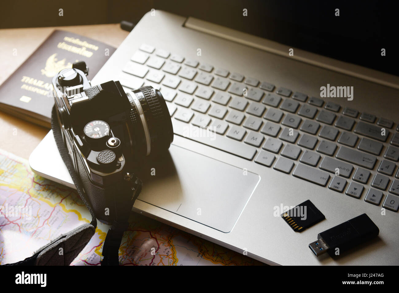 Planning vacation laptop map hi-res stock photography and images - Alamy