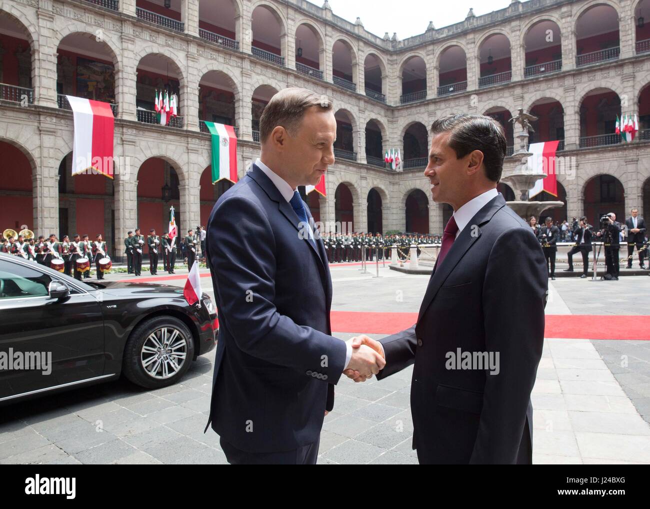 Mexico City, Mexico. 24th April, 2017. Mexican President Enrique Pena Nieto, right, welcomes Polish President Andrzej Duda during the formal arrival ceremony at the national palace April 24, 2017 in Mexico City, Mexico. Credit: Planetpix/Alamy Live News Stock Photo