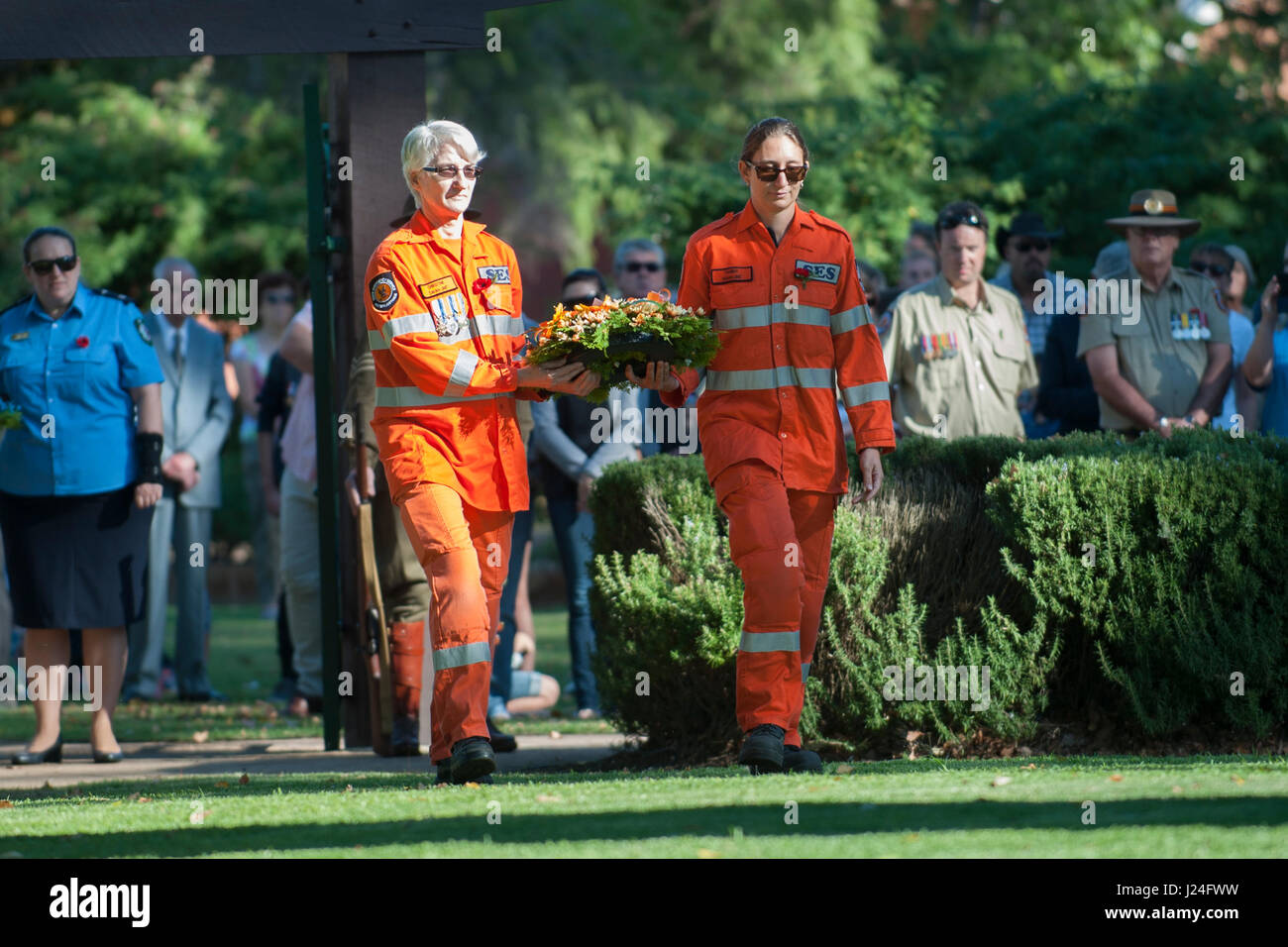 Guildford, Perth, Western Australia, Australia. 25th April, 2017. Western Australian State Emergency Services (SES) volunteers carrying floral wreath at ANZAC Day service in Guildford, Western Australia.    Sheldon Levis/Alamy Live News Stock Photo