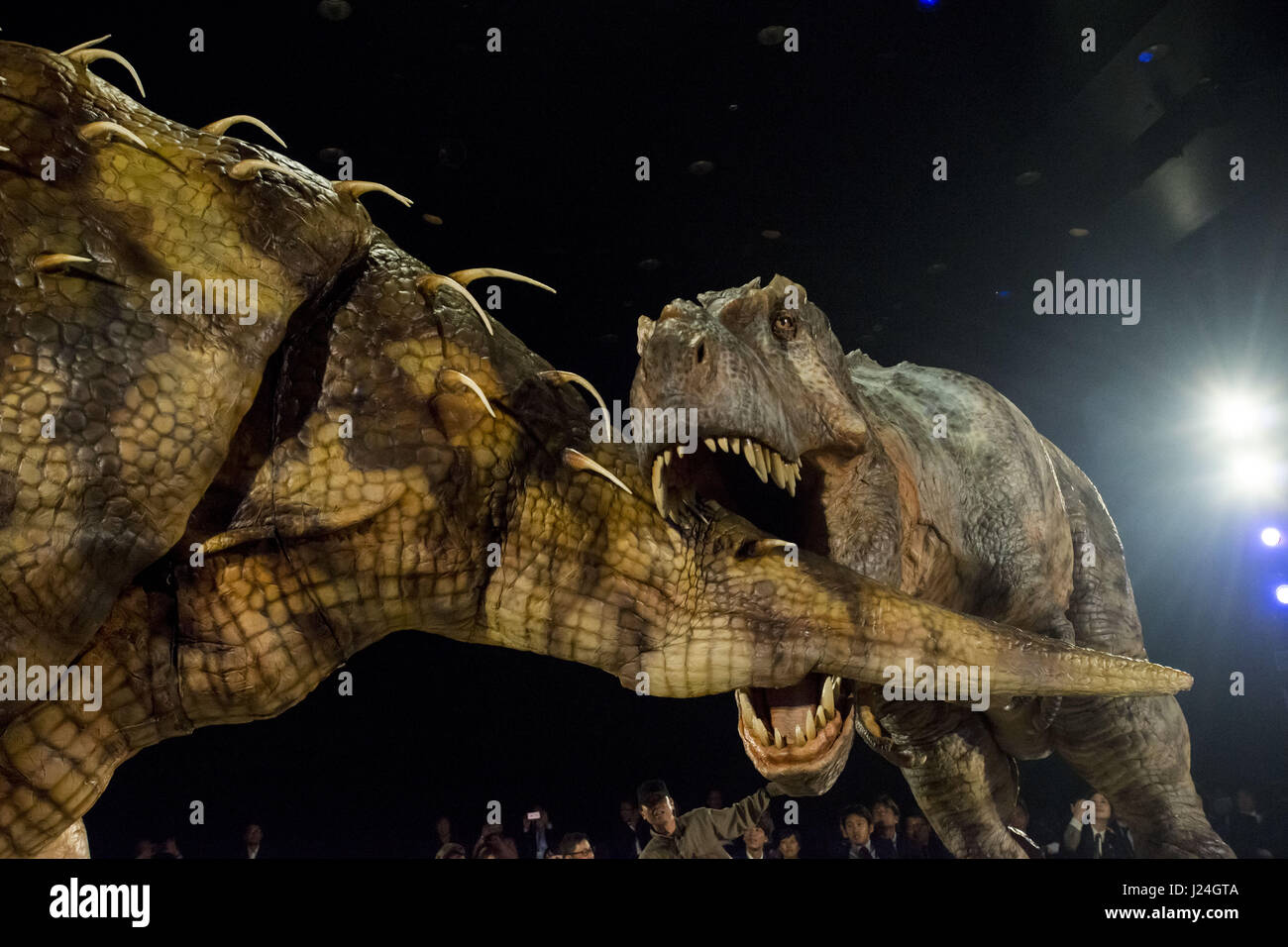 Tokyo, Tokyo, Japan. 25th Apr, 2017. The Dino-Safari exhibition featuring these robotic dinosaurs in Tokyo, Japan. The rubber creatures make use of a 'Dino-Tronics' mechanism, which allows them to smoothly and quietly walk around, and move their heads and jaws. However the dinosaurs are not completely autonomous - performers encased in the models control their movements.The animatronics were created by Japanese firm ON-ART Corp. The exhibit, set to open on Apr. 26 at Hikarie Hall in Tokyo's Shibuya district, will feature the 4.8m tall Raptor Credit: ZUMA Press, Inc./Alamy Live News Stock Photo