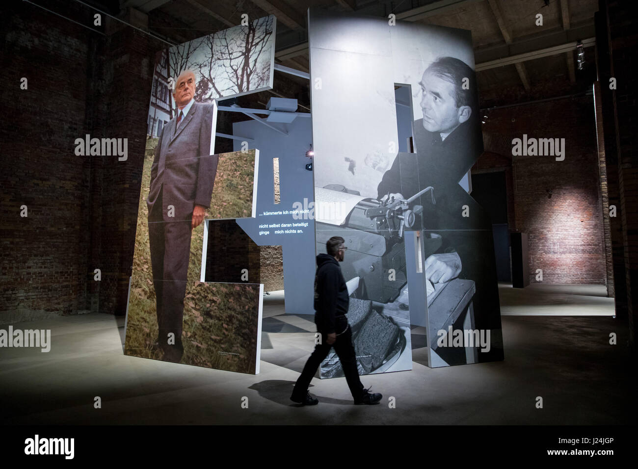 The two giant letters 'E' and 'R' with projections of photos of architect and minister of armaments and war production Albert Speer can be seen at the exhibition 'Albert Speer in der Bundesrepublik. Vom Umgang mit deutscher Vergangenheit' (lit. 'Albert Speer in the Federal Republic. On handling German past' at the Dokumentationszentrum Reichsparteigelaende (lit. 'Documentation Center Reichs Party Grounds') in Nuremberg, Germany, 25 April 2017. Using historical documents, the exhibition wants to proof that Speer was not, as assumed, an apolitical technocrate who did not know about the crimes of Stock Photo