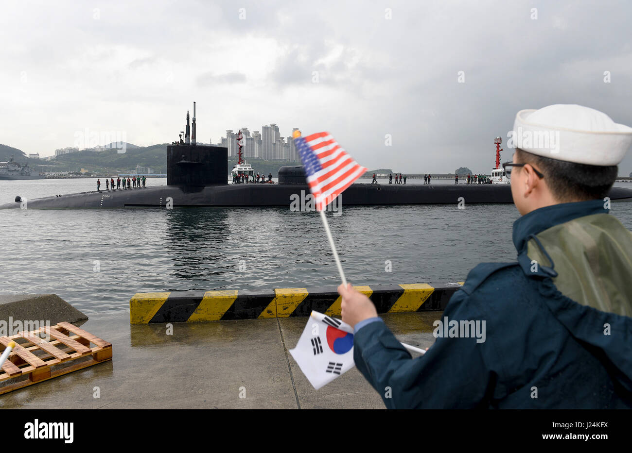 Philippine Sea. 24th Apr, 2017. The U.S. Navy Ohio-class guided-missile submarine USS Michigan comes into port for supplies April 24, 2017 in Busan, South Korea. The Michigan is armed with 150 Tomahawk missiles and is paying a port visit to South Korea as tensions continue to rise between the U.S. and North Korea. Credit: Planetpix/Alamy Live News Stock Photo