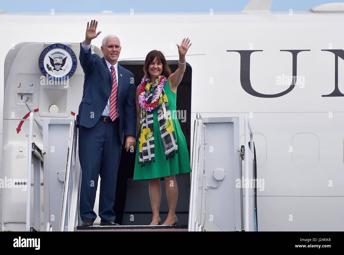 Honolulu, Hawaii. 25th Apr, 2017. U.S. Vice President Mike Pence and wife Karen wave goodbye as they board Air Force Two on the way back to Washington after a short visit to Hawaii April 25, 2017 in Honolulu, Hawaii. Credit: Planetpix/Alamy Live News Stock Photo