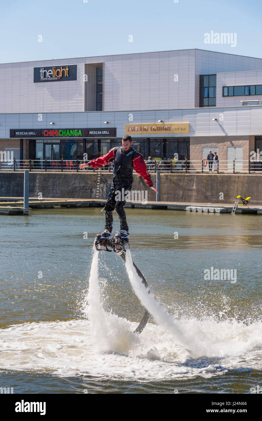 Flying on water jets. Power water jets Stock Photo Alamy