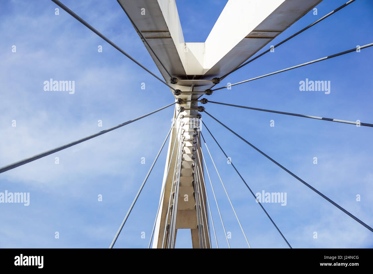 Cables and tower of the suspension bridge . Stock Photo