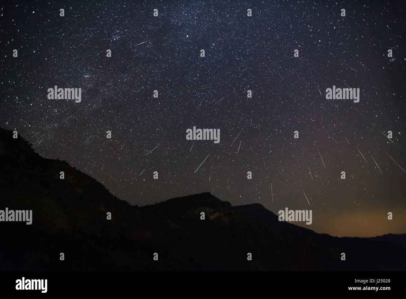 Geminid Meteor in the night sky Stock Photo