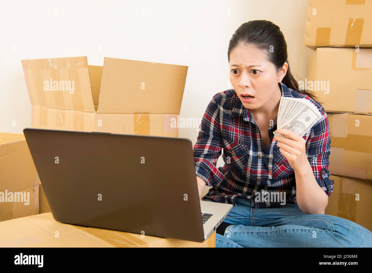 woman worried and shocked about rent increase not enough money to buy