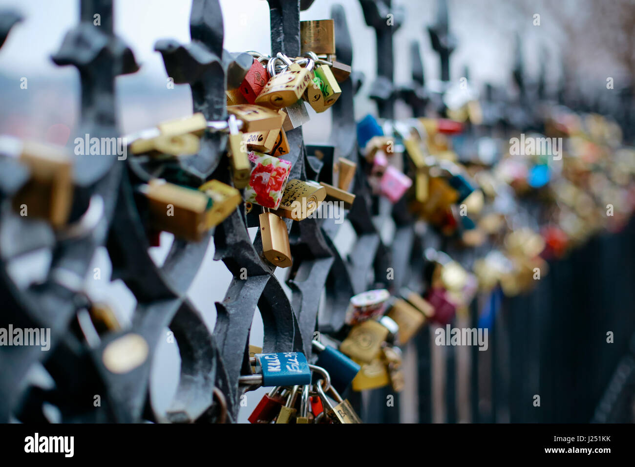 Love locks on a metal fence near Charles Bridge in Prague Stock Photo
