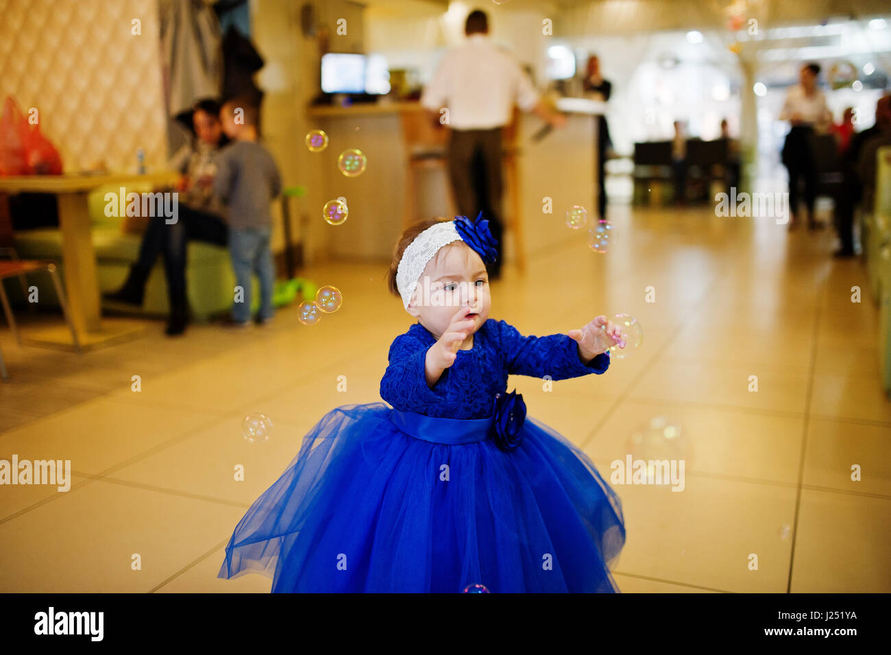 cute baby with blue dress