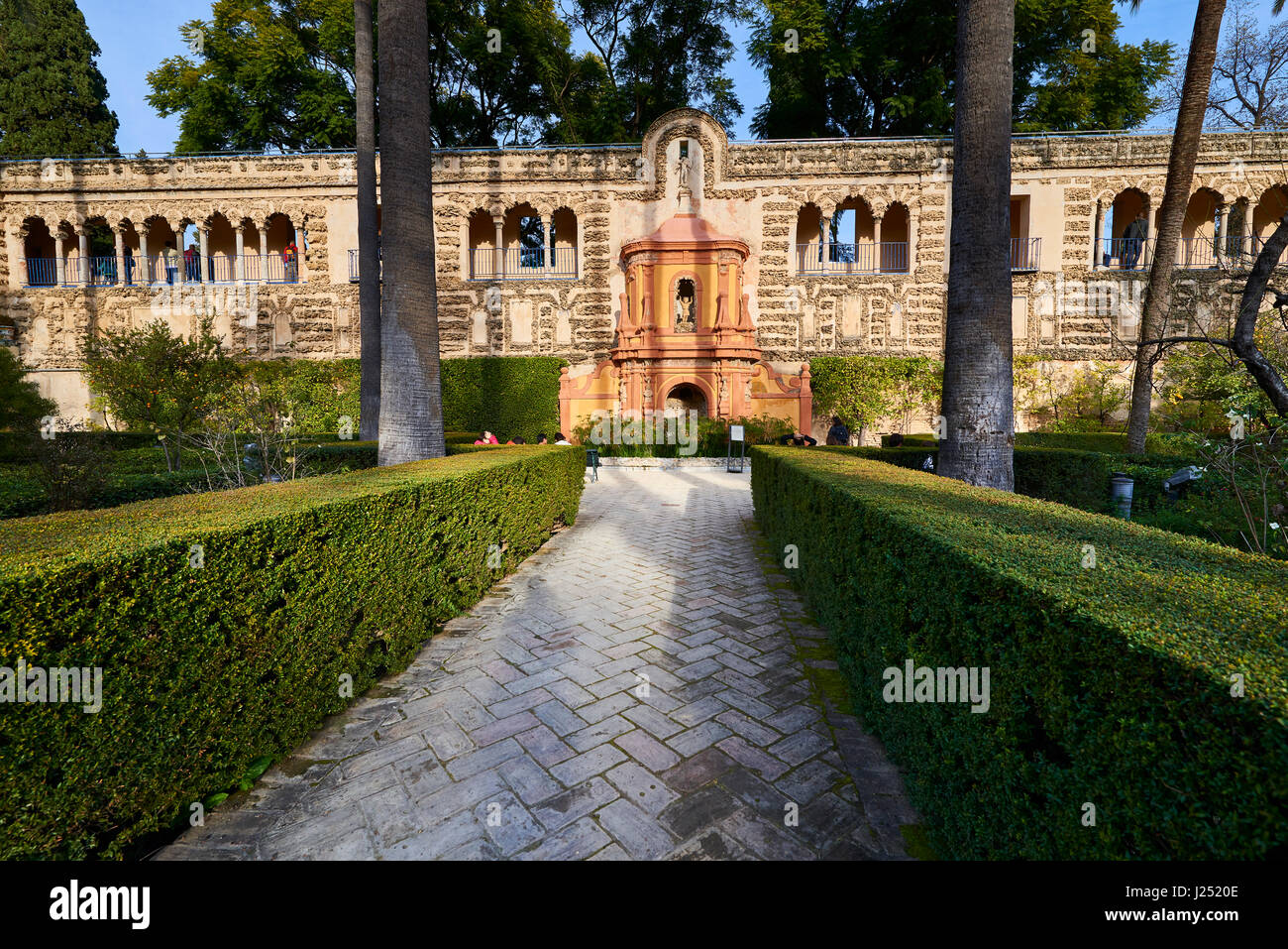 Gardens in Reales Alcazares in Seville - residence developed from a former Moorish Palace in Andalusia, Spain Stock Photo