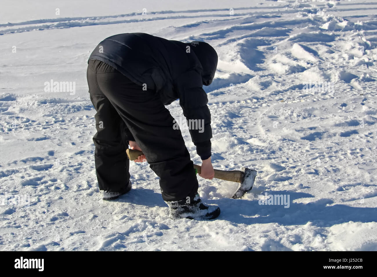 Bobber in a Hole in the Ice Stock Photo - Image of cracksinice,  winterfishing: 58142772