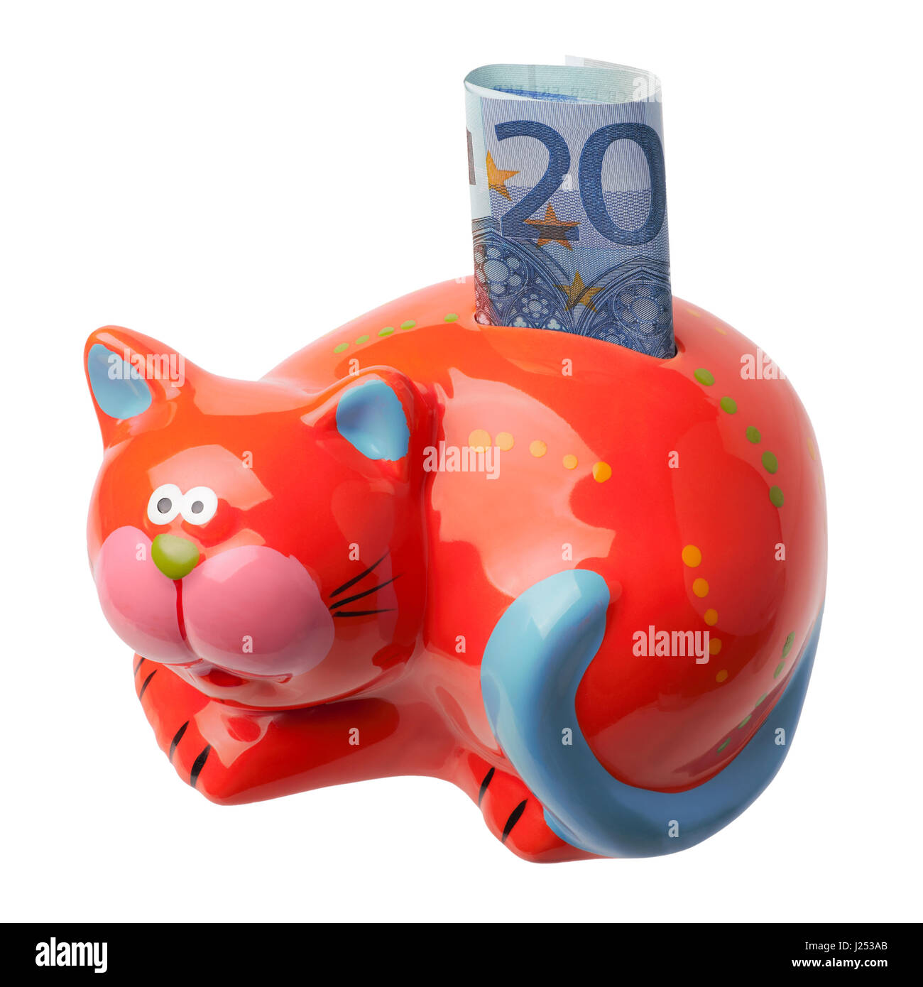 Salvadanaio in ceramica bianca che guarda alle banconote in euro arrotolate  Foto stock - Alamy