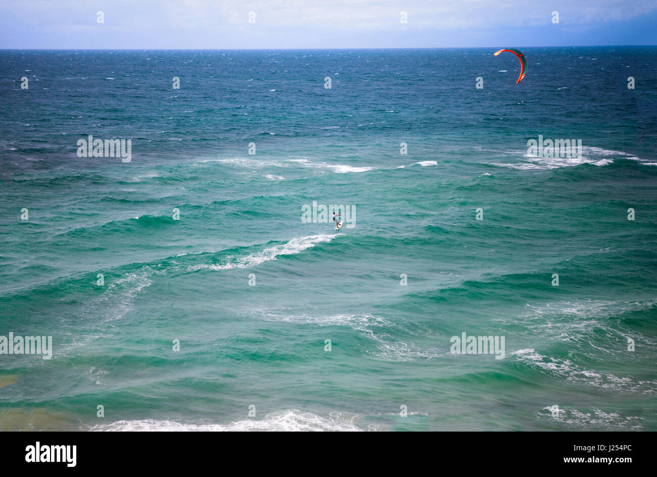 kite surfer surfing, extreme water sport Stock Photo