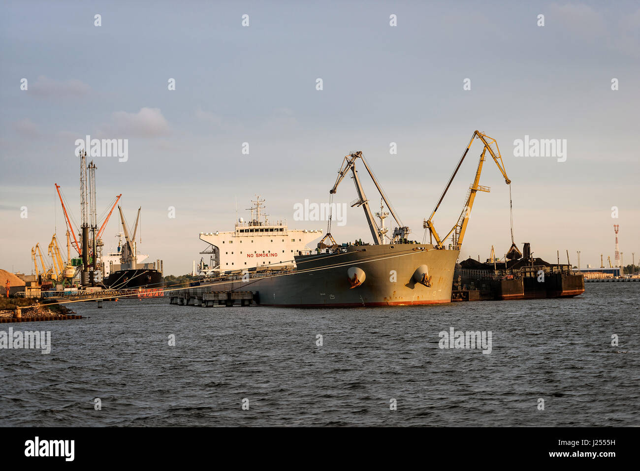Ship transshipment of the port channel Stock Photo - Alamy