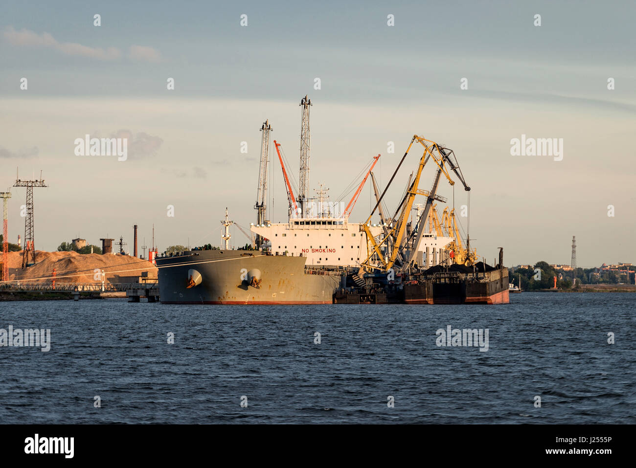 Ship transshipment of the port channel Stock Photo - Alamy