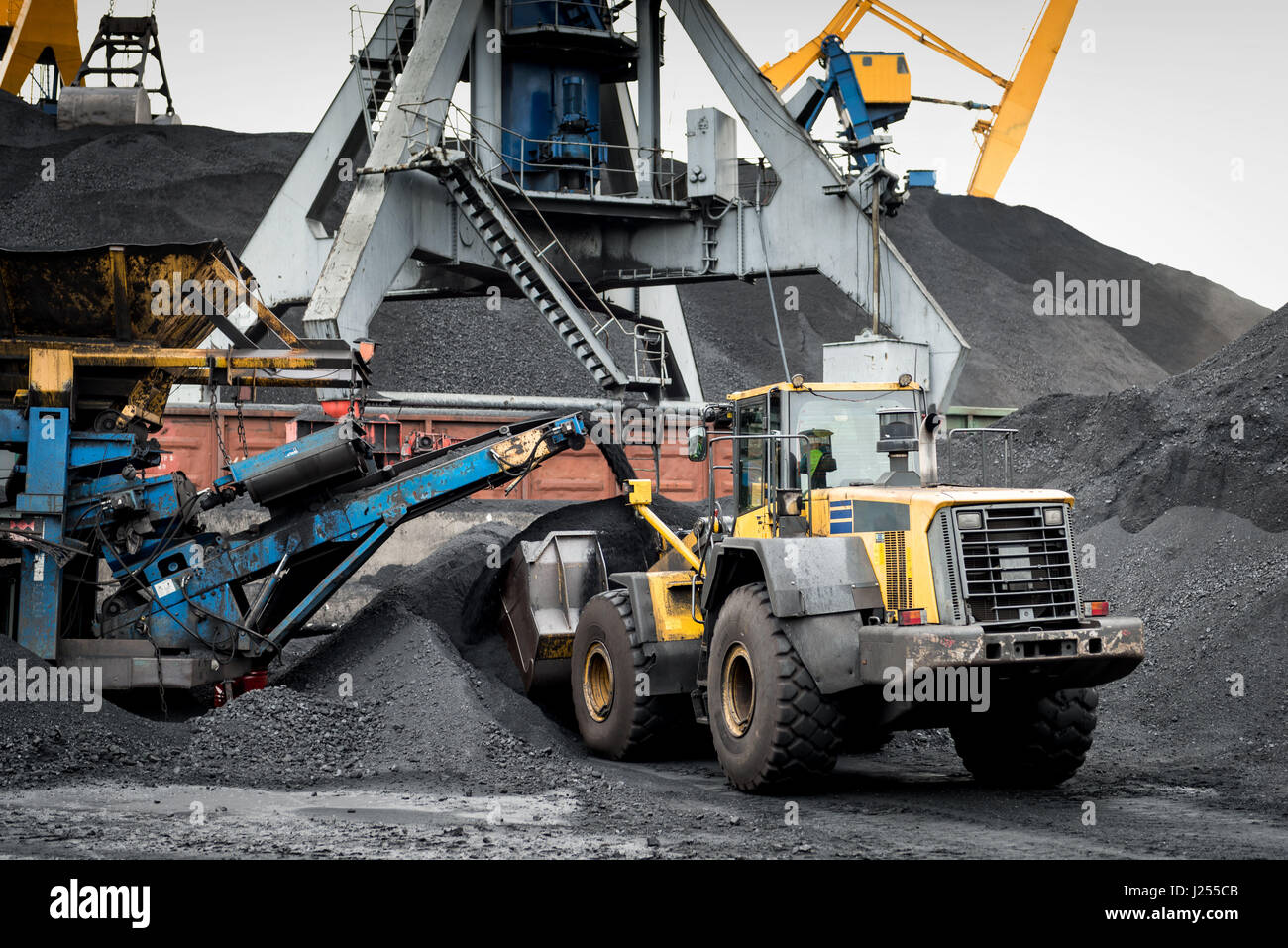 Work in port coal handling terminal Stock Photo - Alamy