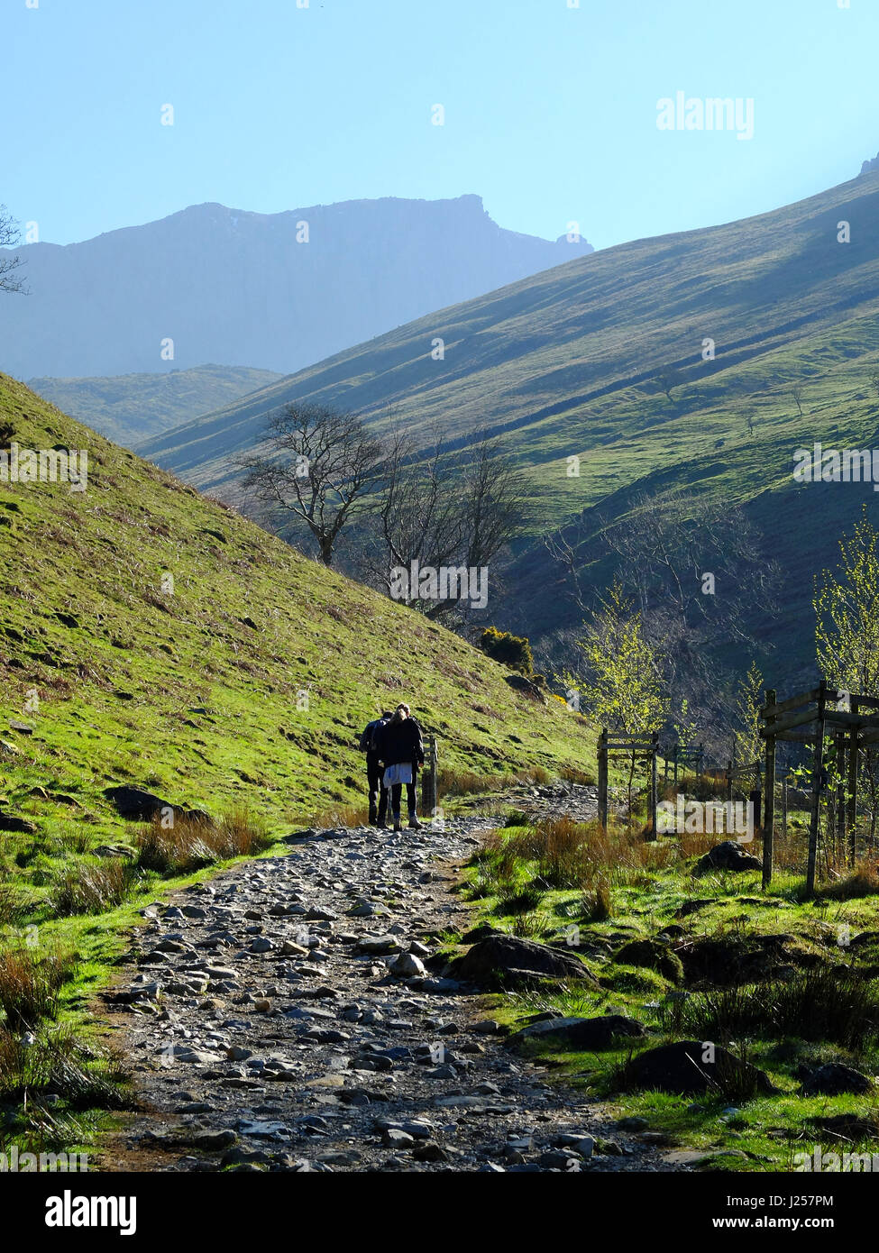 People hiking up to Scafell Pike in the Lade District, Cumbria, England's highest mountain. Stock Photo