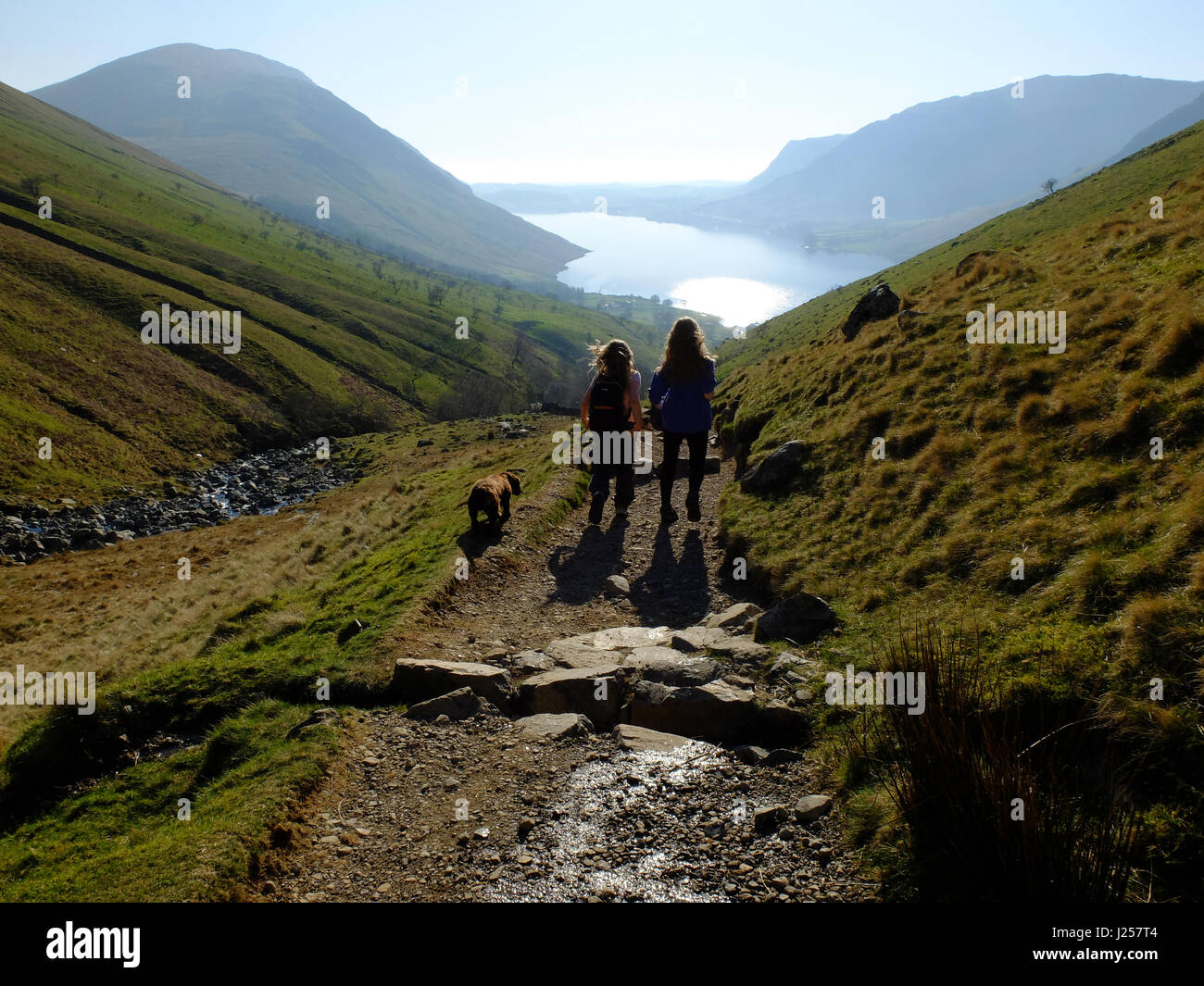 People hiking up to Scafell Pike in the Lade District, Cumbria, England's highest mountain. Stock Photo