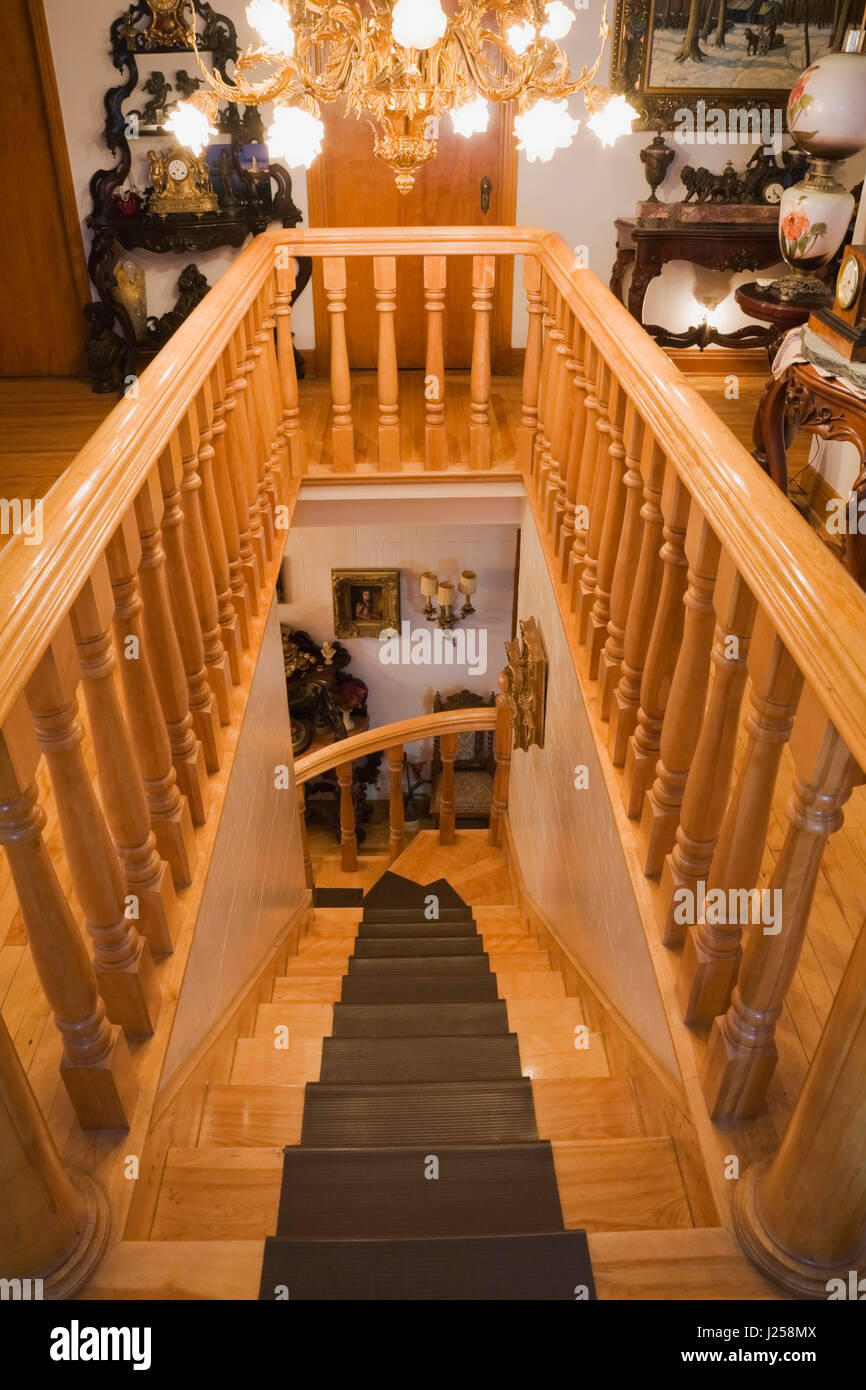 Wooden staircase inside an old Victorian mansion Stock Photo