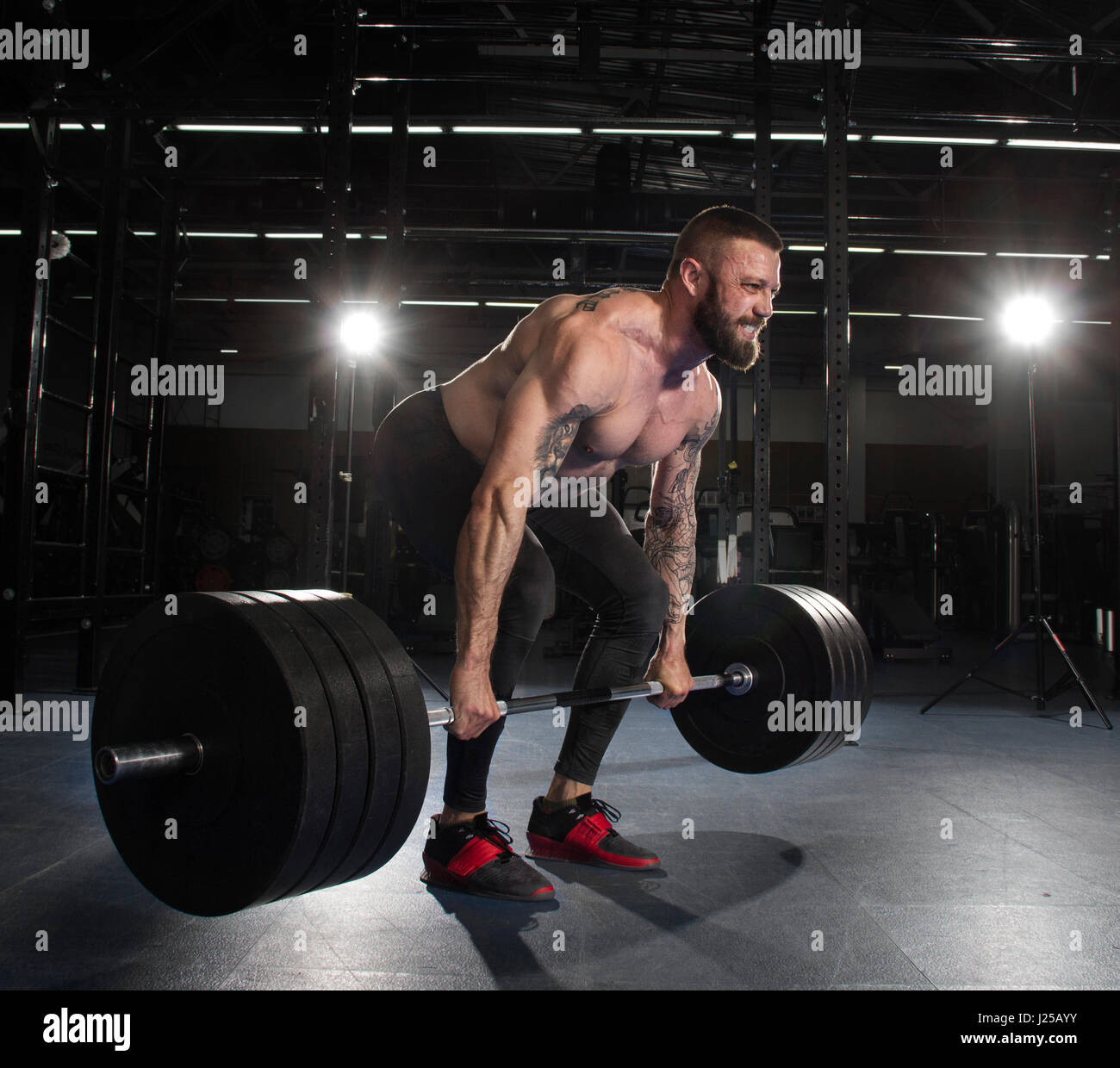 Premium Photo  Young woman doing deadlift with a barbell isolated