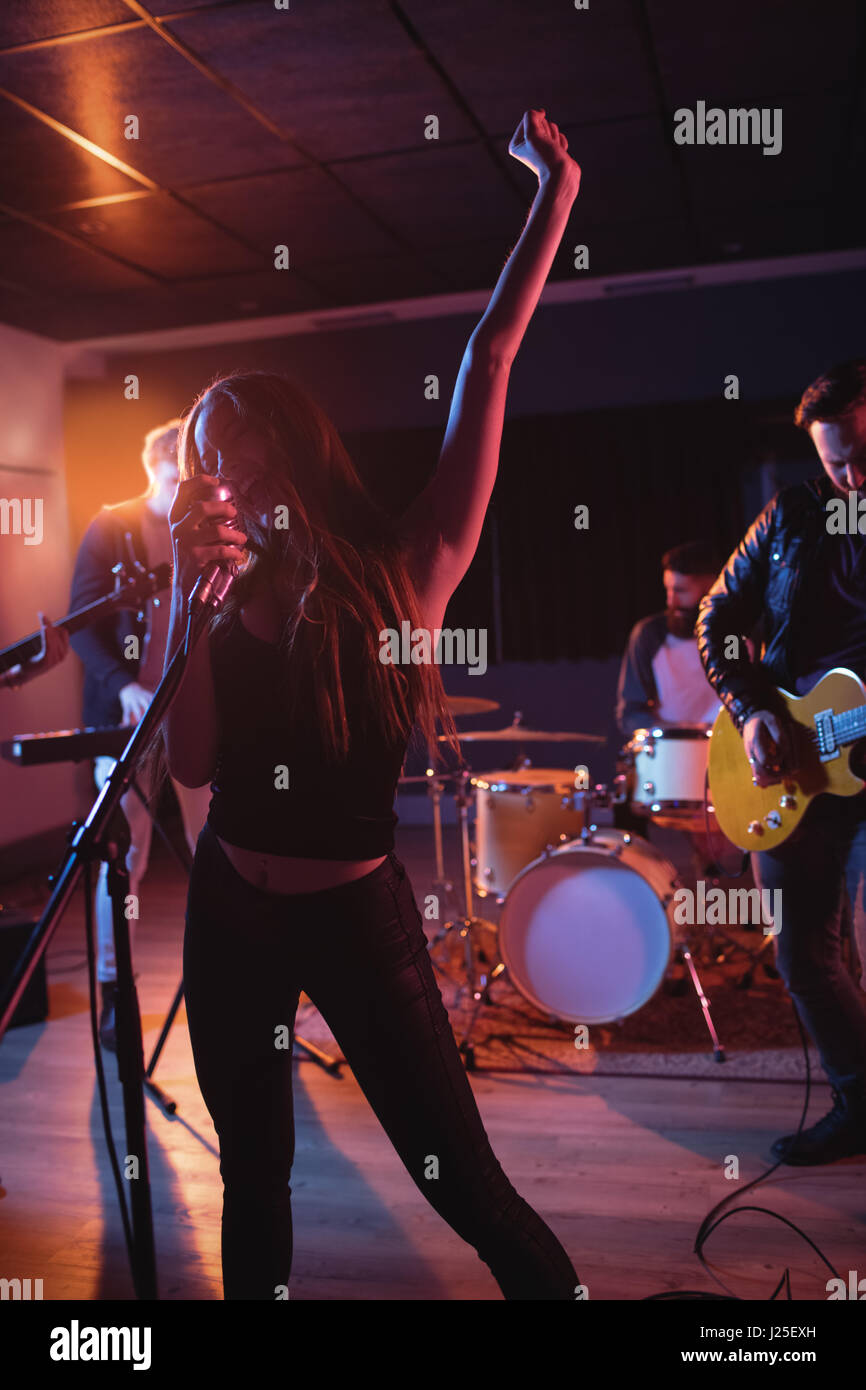 Band performing in recording studio Stock Photo Alamy