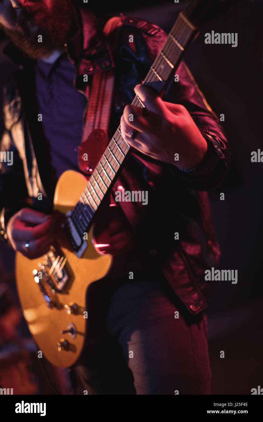 Musician playing electronic guitar in recording studio Stock Photo Alamy