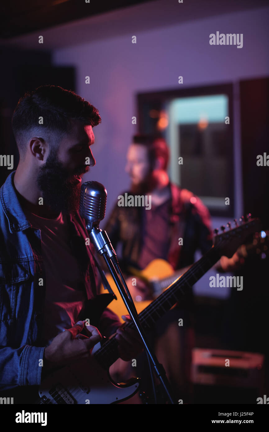 Singer singing in recording hi-res stock photography and images - Alamy