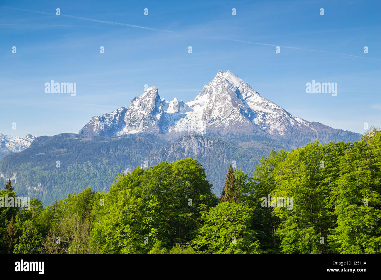 Closeup view of famous Watzmann mountain peak on a beautiful sunny day with blue sky and clouds in summer, Nationalpark Berchtesgadener Land, Bavaria Stock Photo