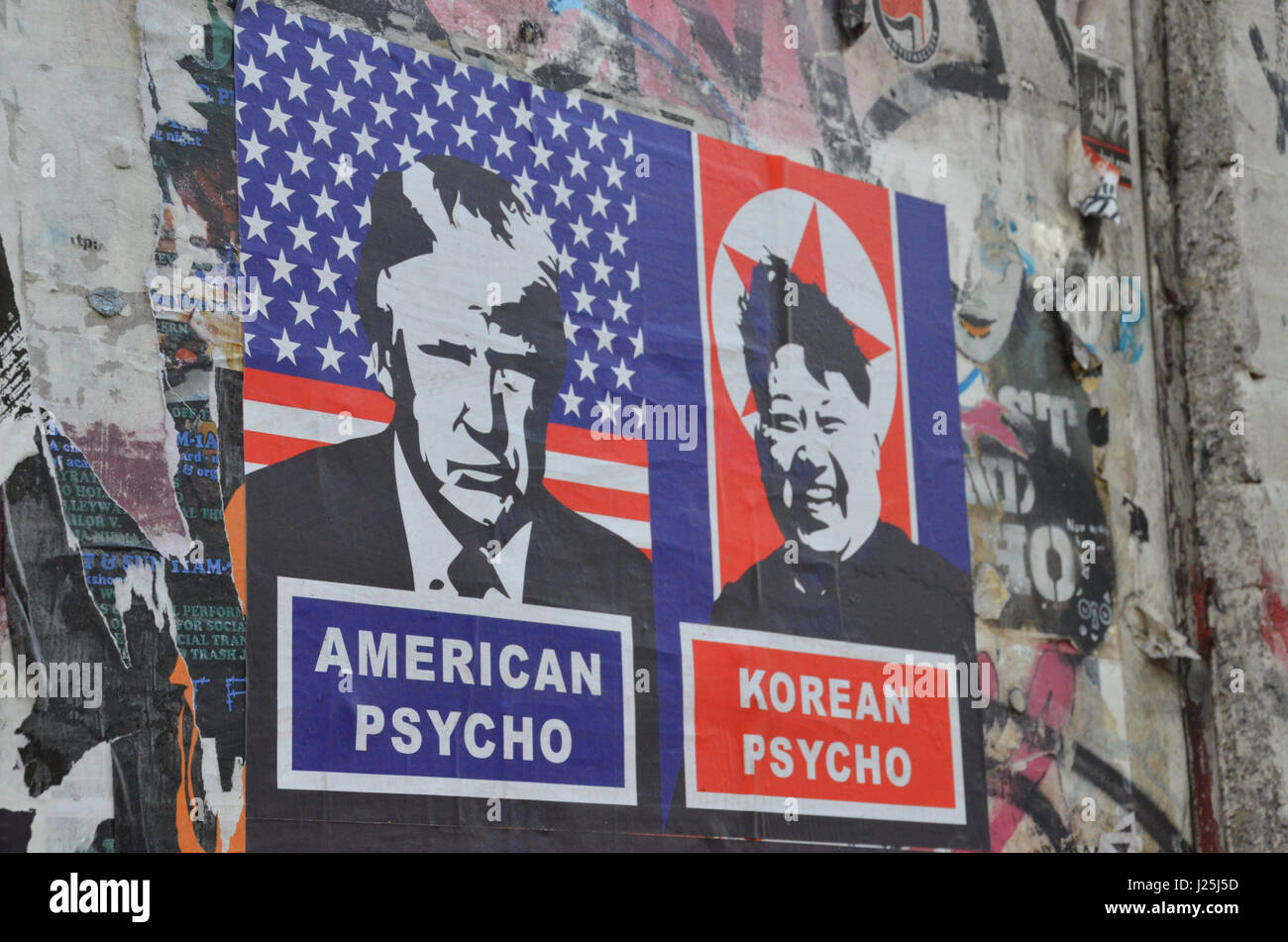 A poster depicting Donald Trump and Kim Jong-Un on Brick Lane (Shoreditch, London, UK. 22 April 2017. Credit: Robert Smith/Alamy) Stock Photo