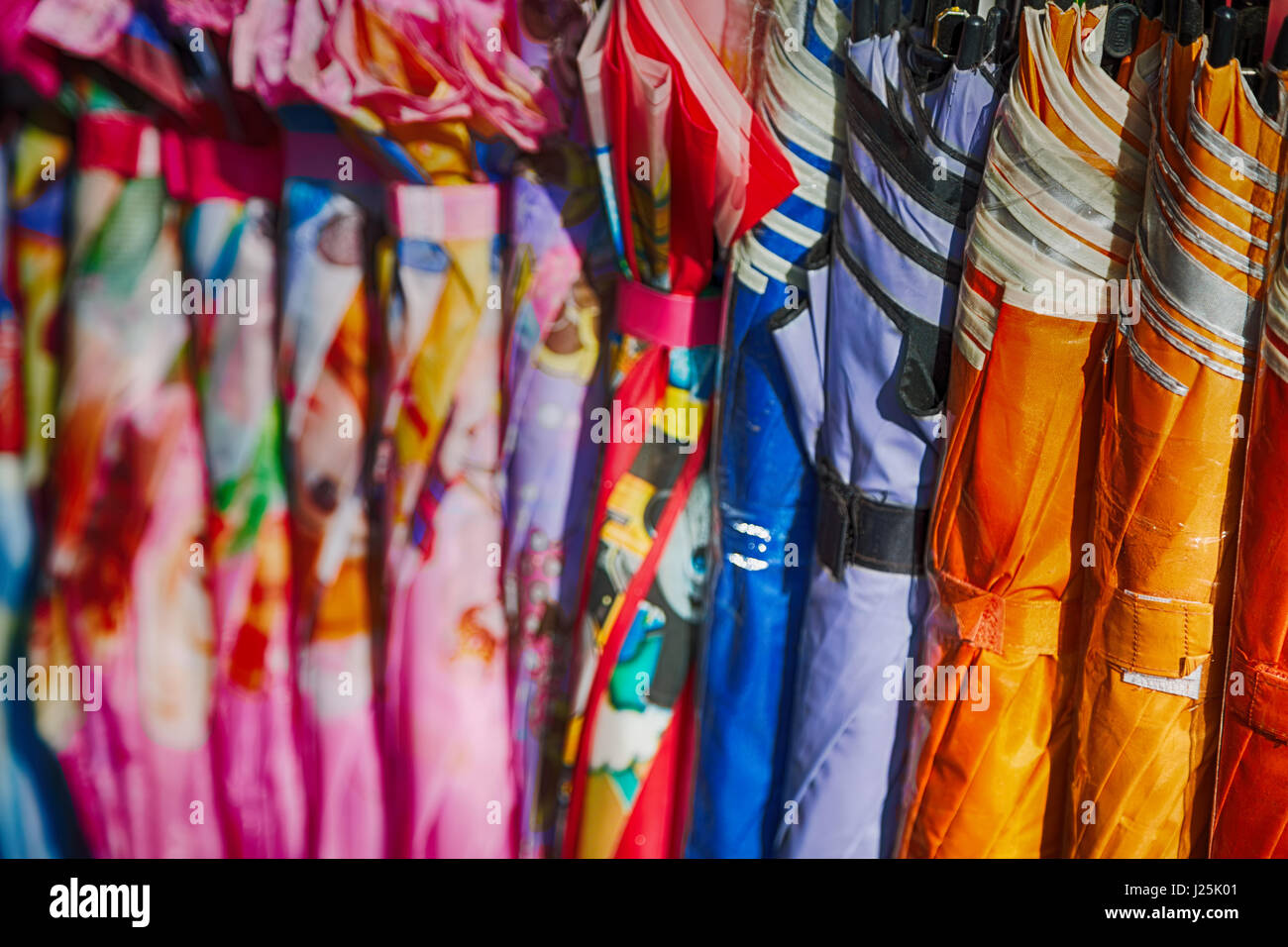 in a philippines market texture of umbrella for kids Stock Photo - Alamy